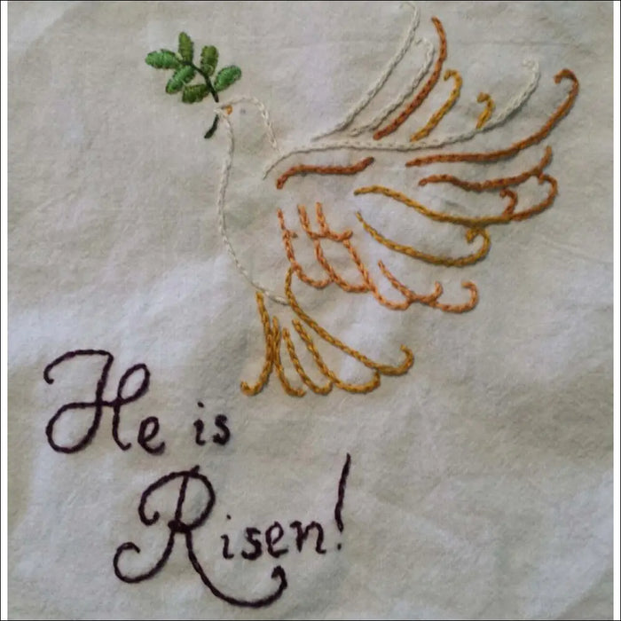 Embroidered dove with He is Risen text and leaf design from Aunt Martha’s Christian Blessings